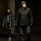 Madison Taylor Baez as Eleanor and Demián Bichir as Mark in a dark room